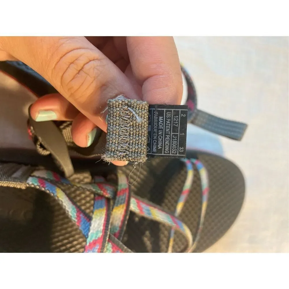 Chaco Kids Black Footbed Sandals with Multicolor Webbing and Pink Midsole